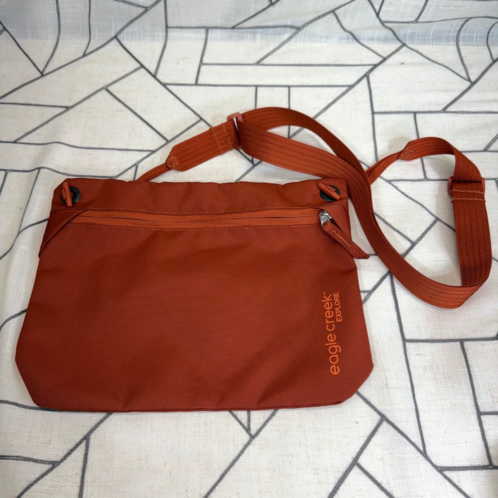 Eagle Creek Explore Sacoche Bag OS Rust Orange Crossbody Travel Pouch EC0A5LQ5
